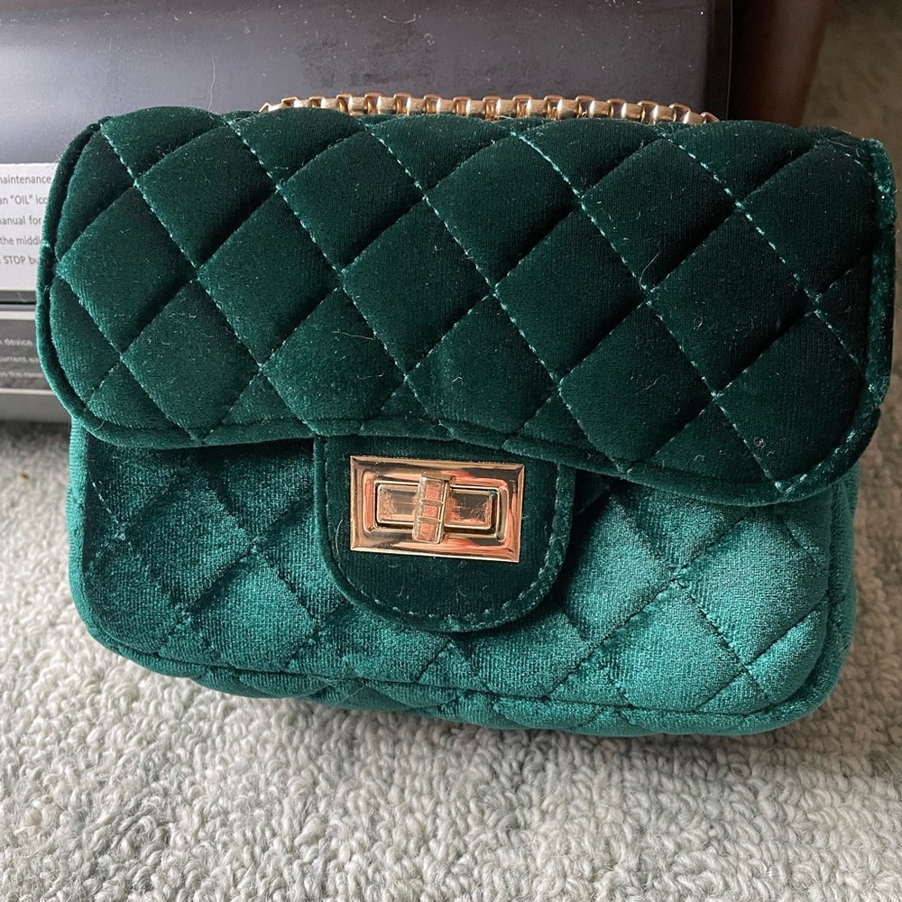 Adjustable length velvet handbag from a boutique in San Diego